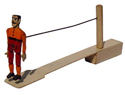 Carved, articulated dancing man