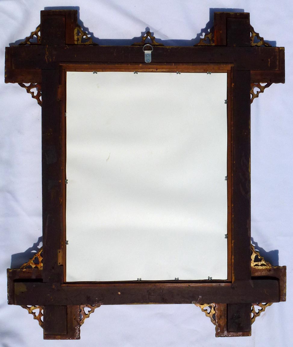 Large, intricate tramp art frame