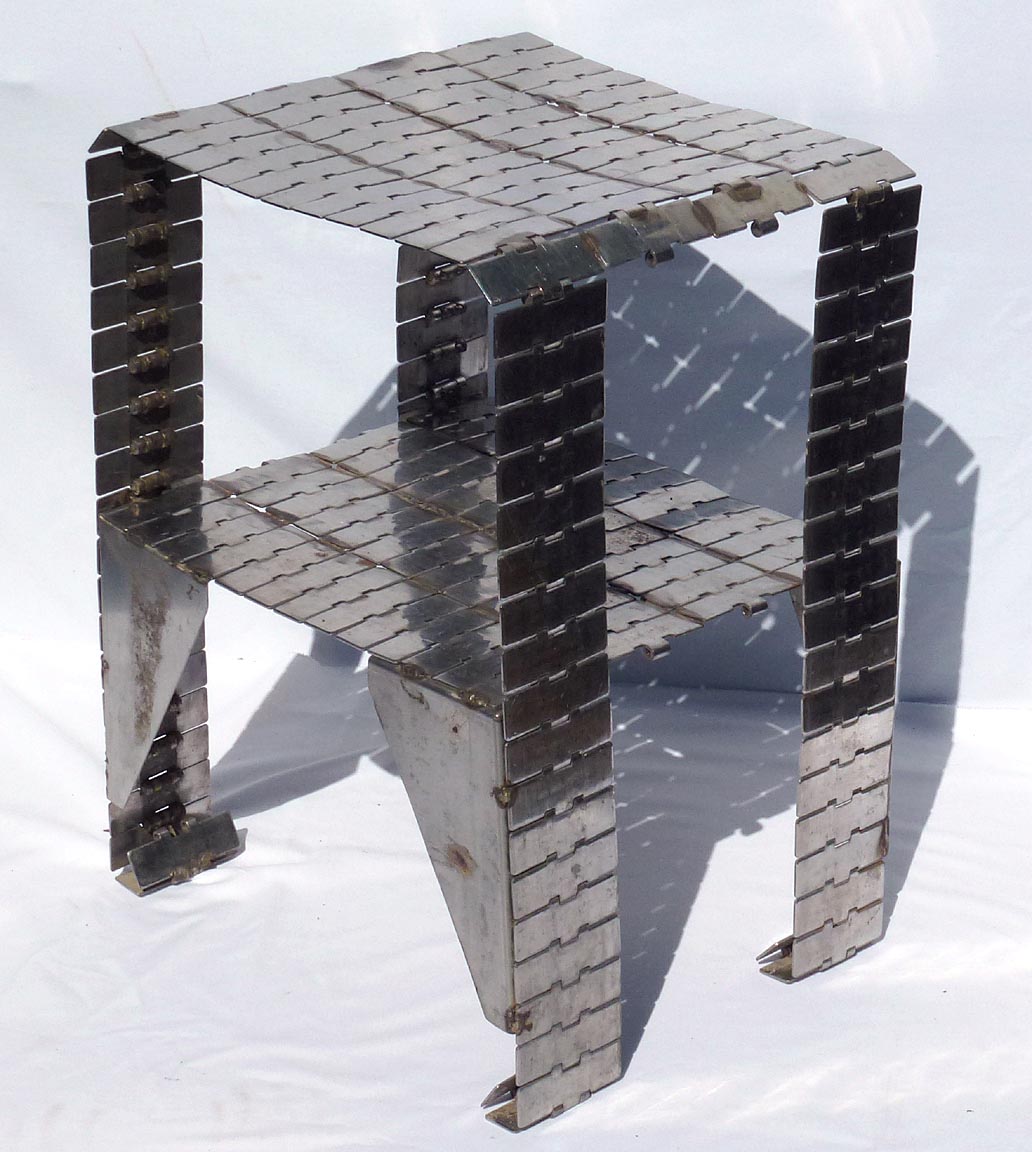 Metal table made from industrial conveyor belt