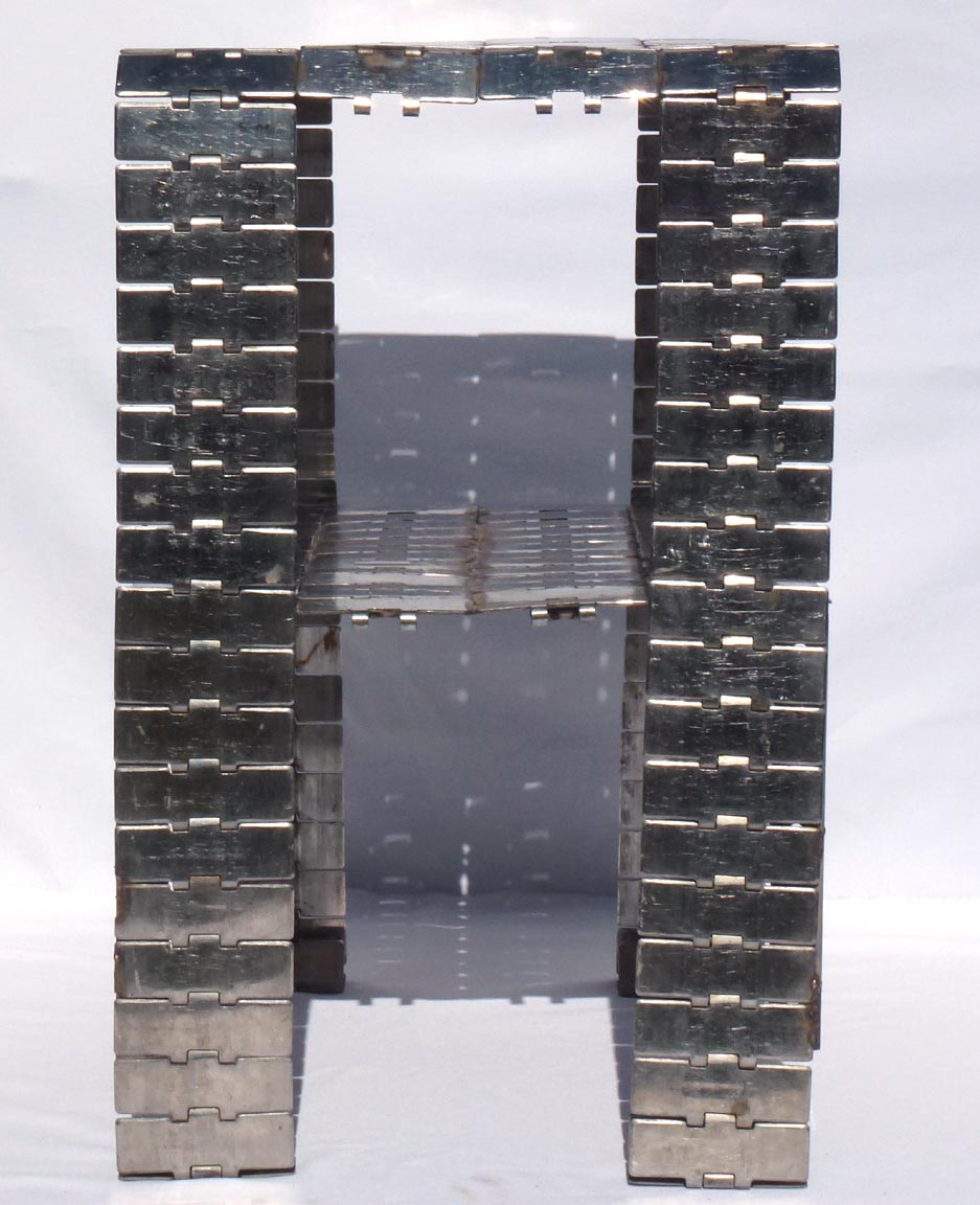 Metal table made from industrial conveyor belt