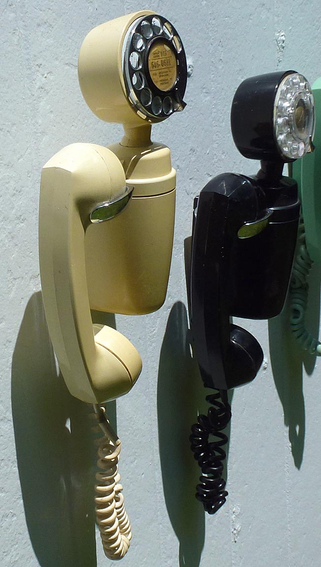 Two decorative telephones
