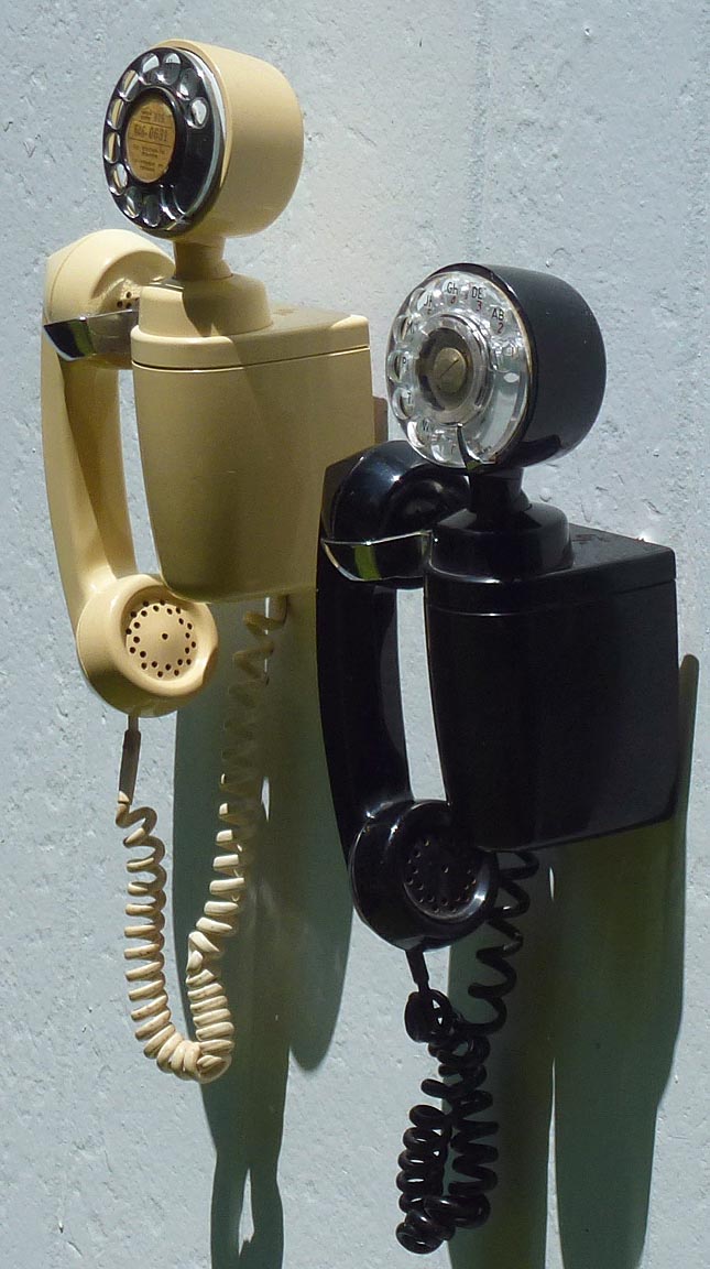 Two decorative telephones