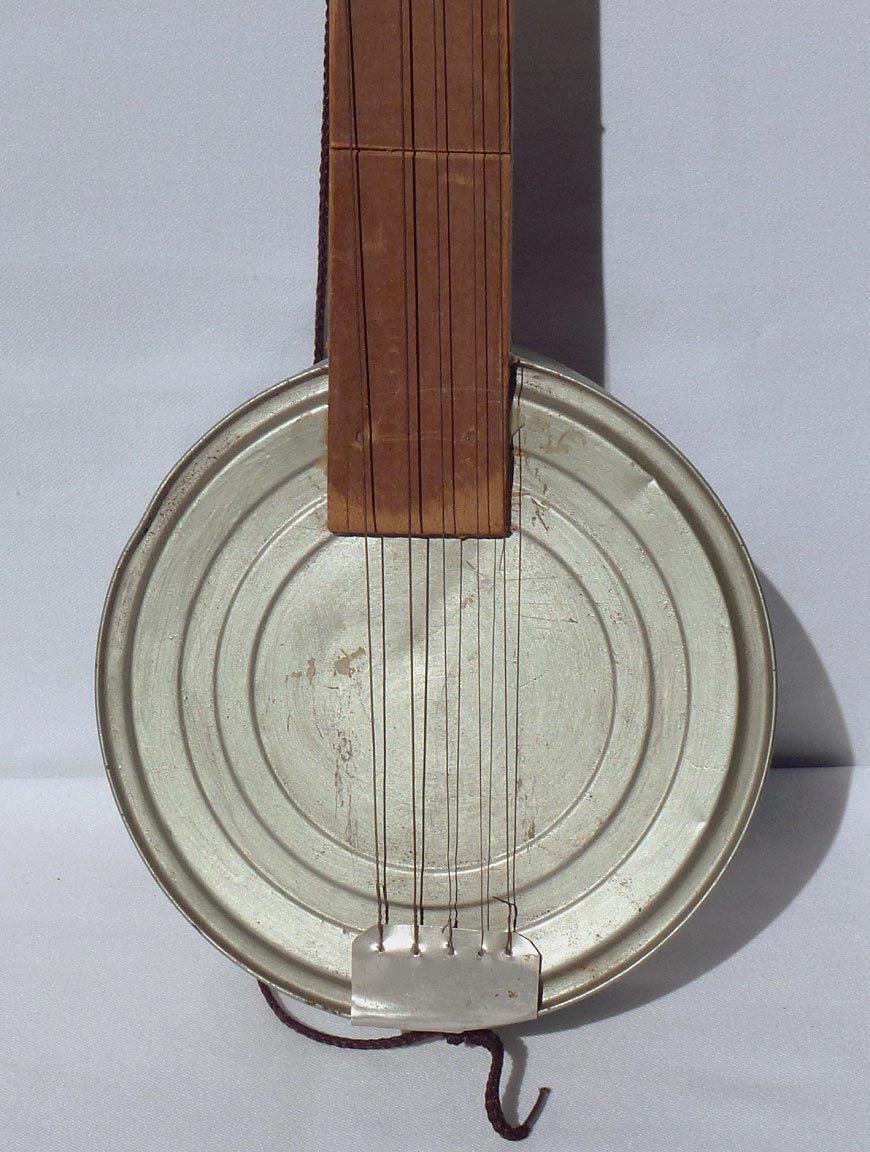 Folky hand made tin can banjo