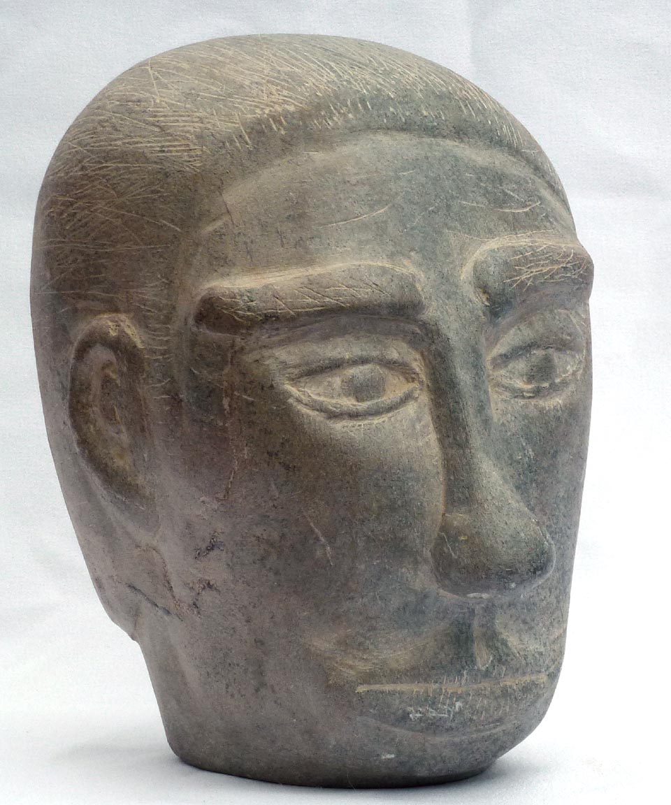 Carved stone head