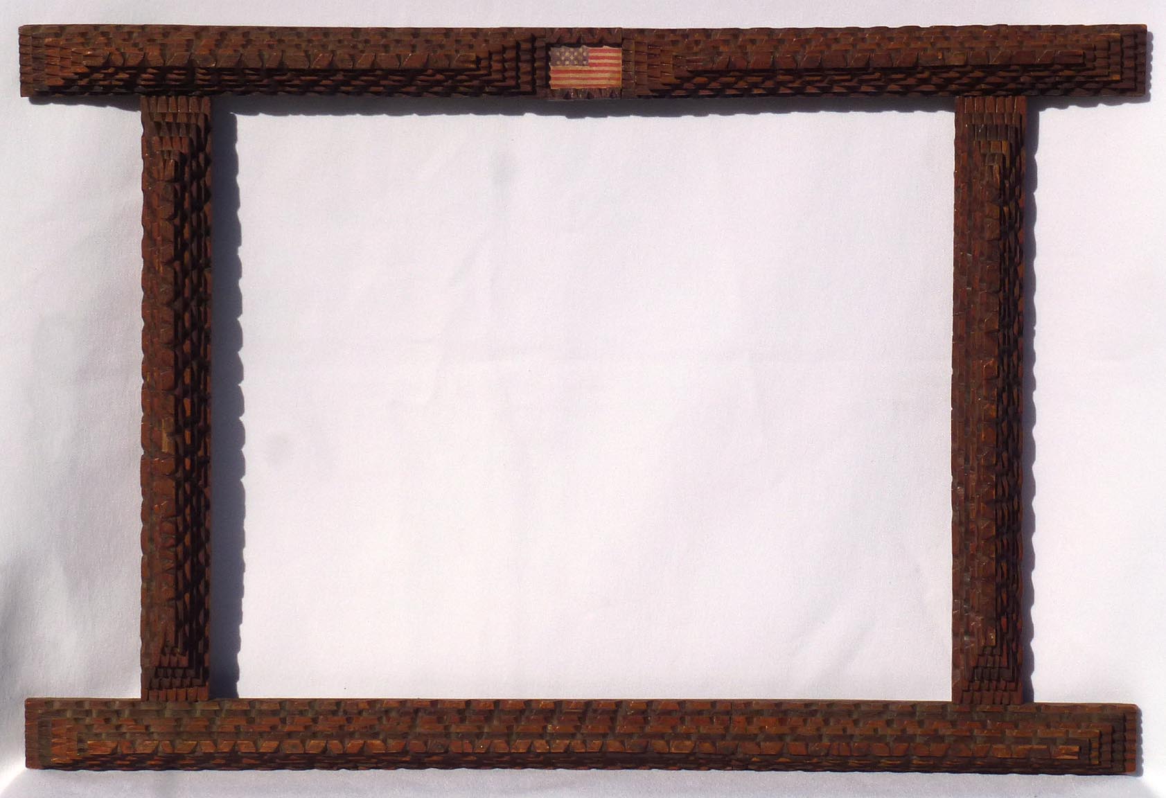 Tramp art frame with flag