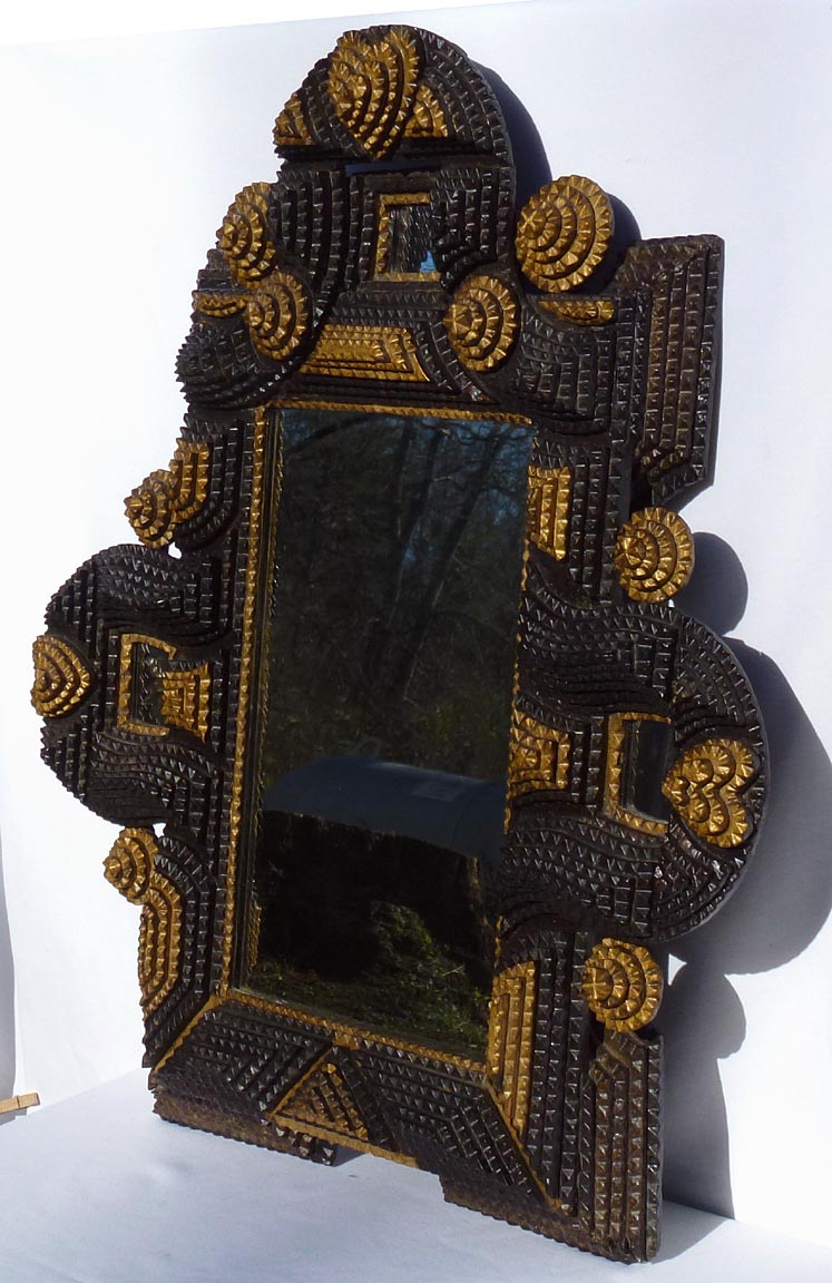 Elaborate tramp art frame with hearts and mirrors