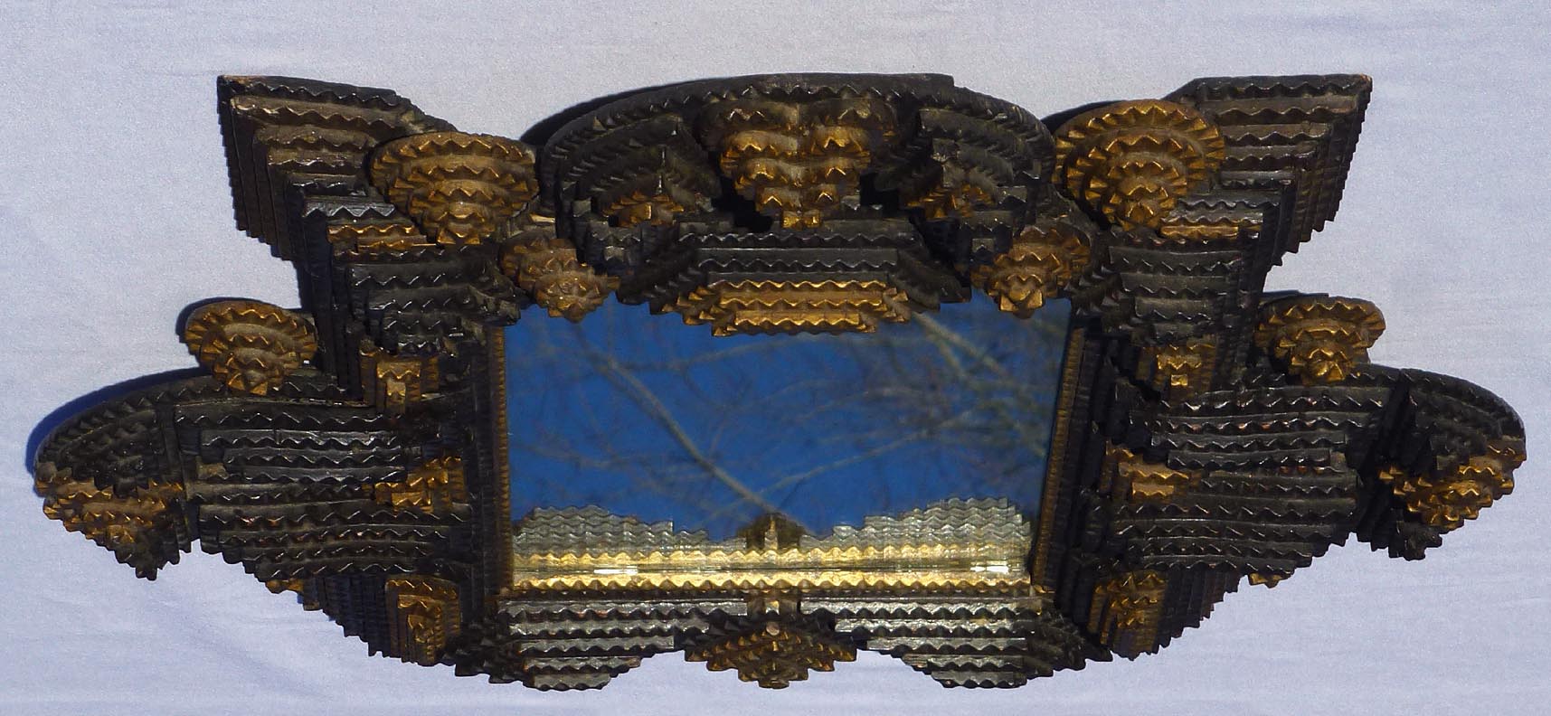Elaborate tramp art frame with hearts and mirrors