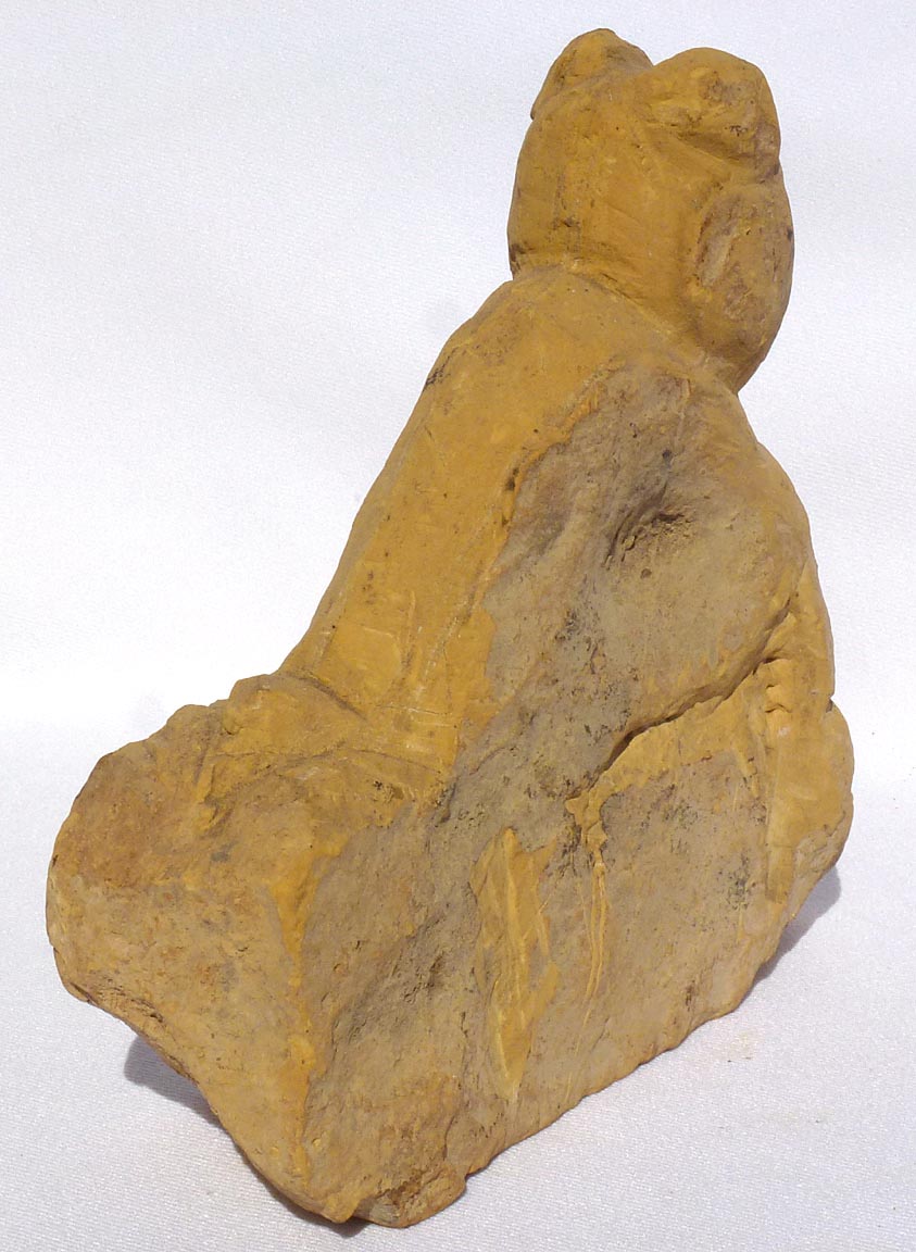 Brick end of day carving dog