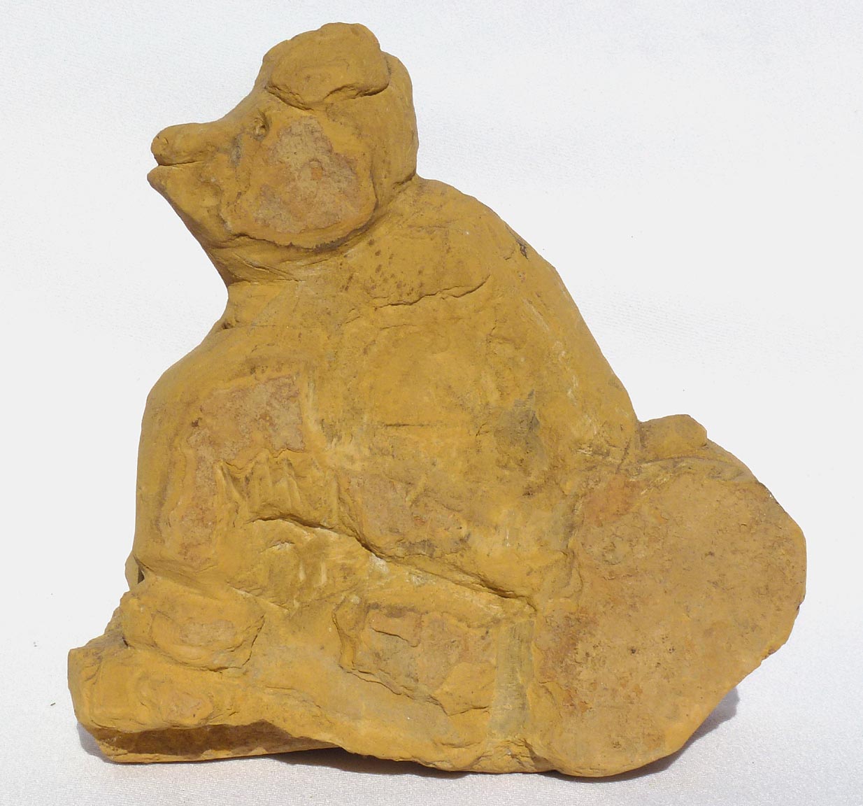 Brick end of day carving dog