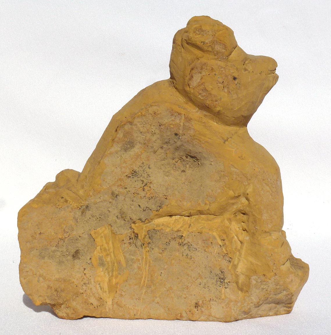 Brick end of day carving dog