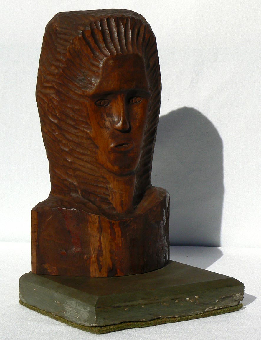 Carved bust on stone base