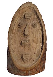 Primitive carved face