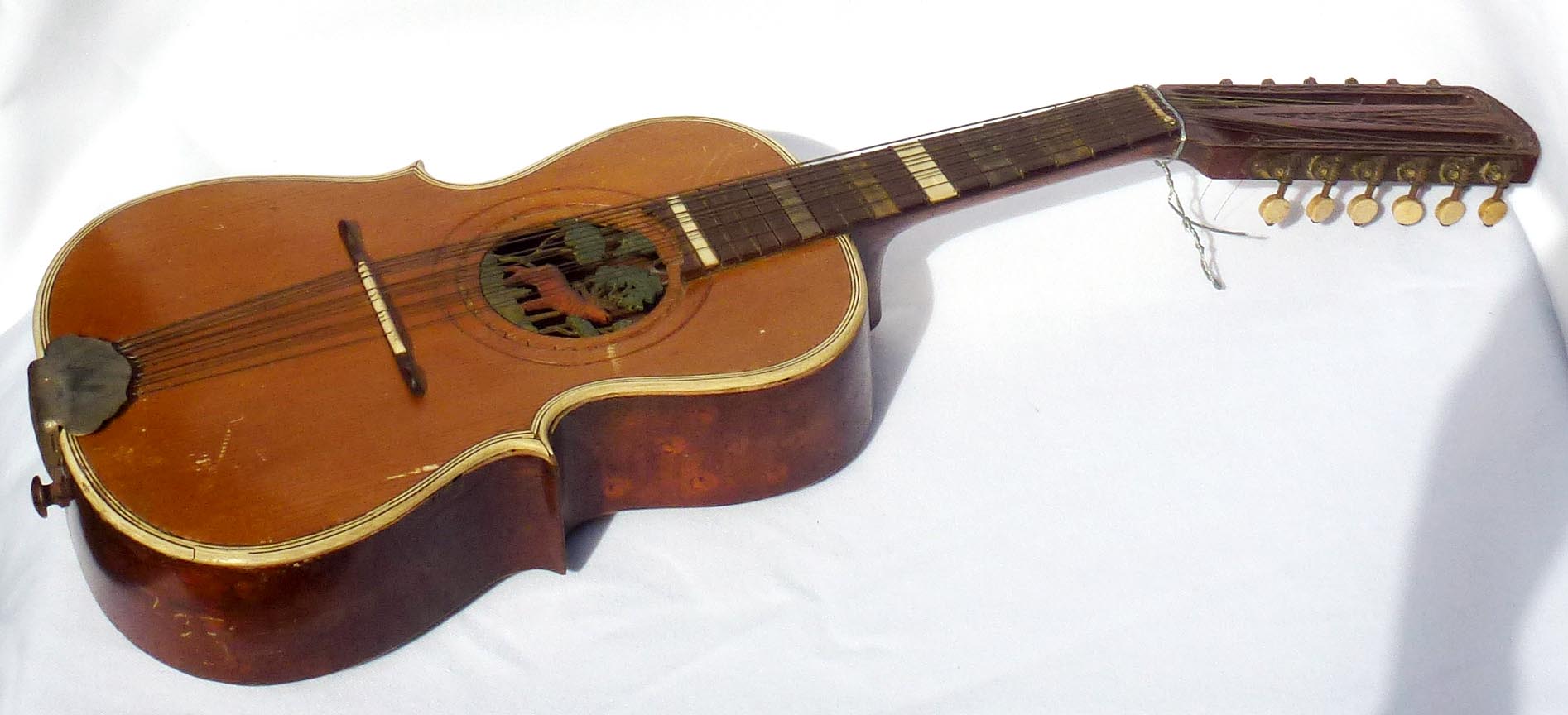 Folk art carved guitar