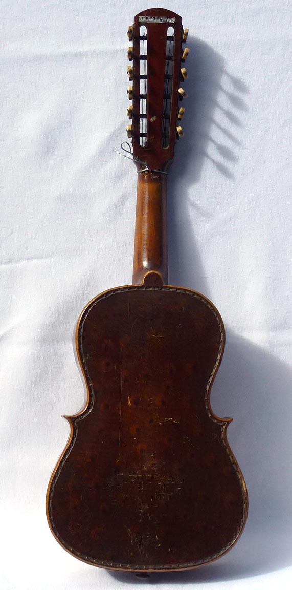 Folk art carved guitar