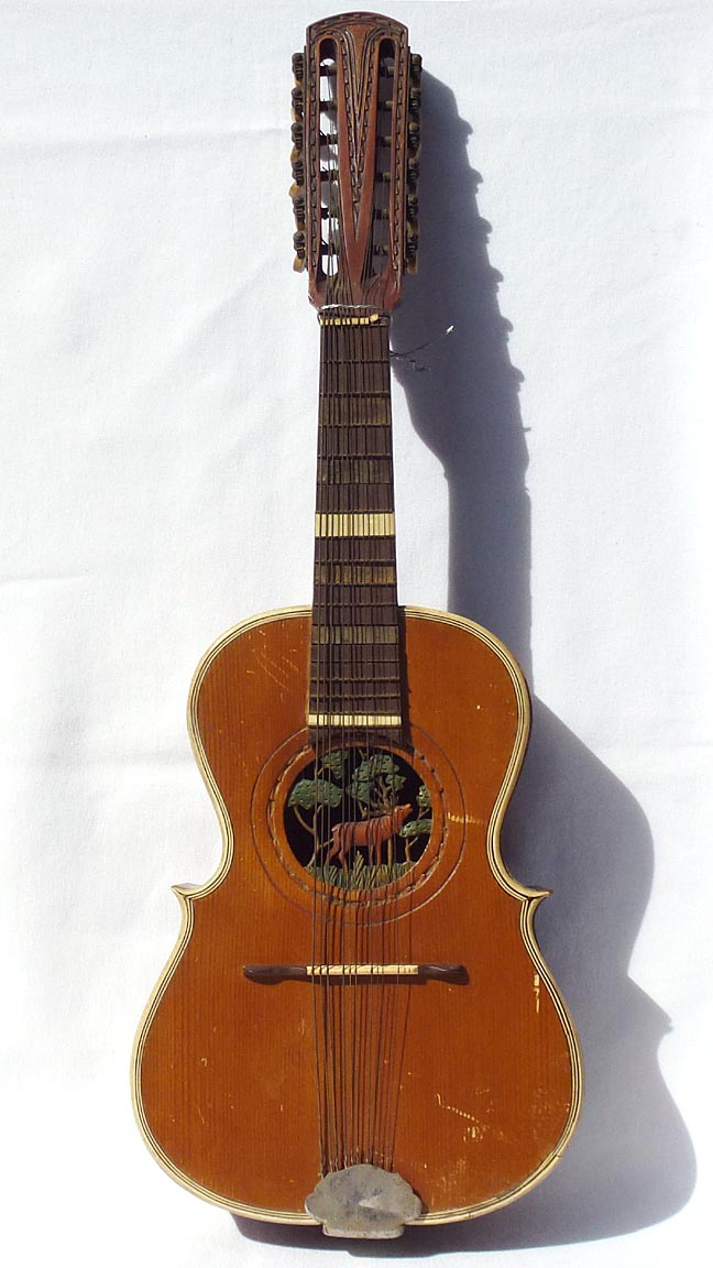 Folk art carved guitar