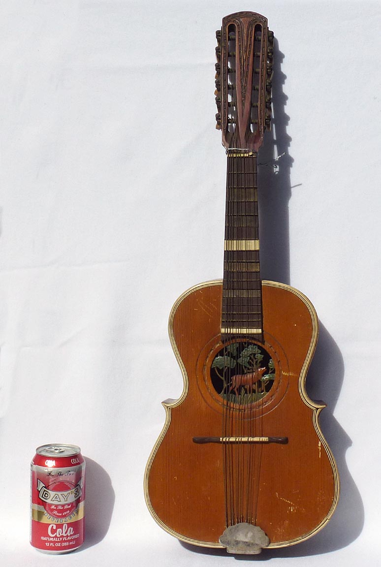 Folk art carved guitar