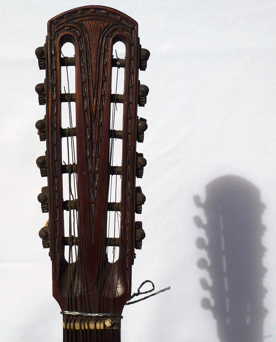 Folk art carved guitar