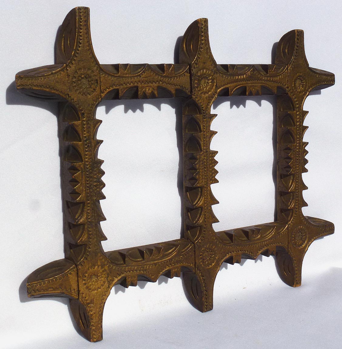 Finely carved double frame