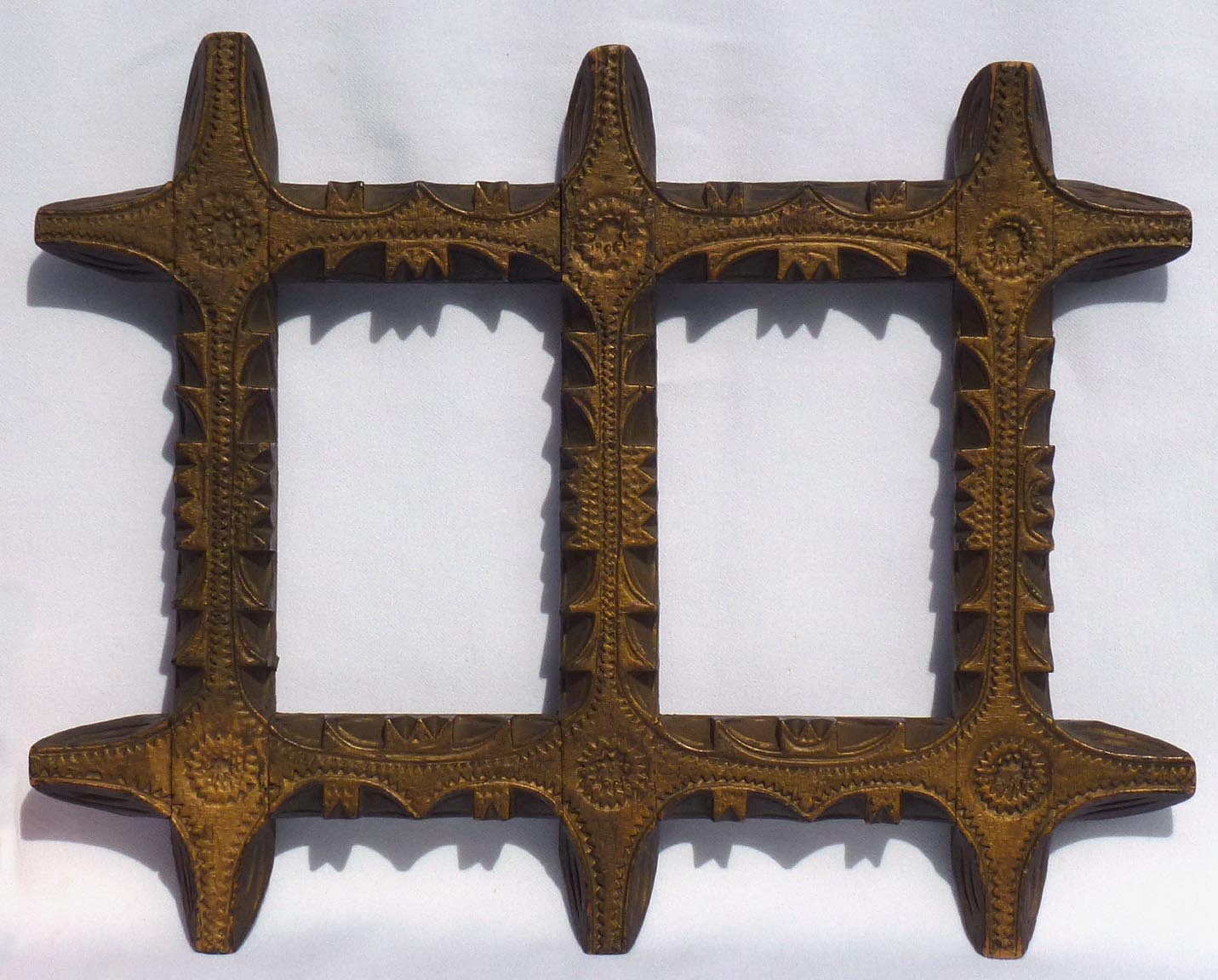 Finely carved double frame