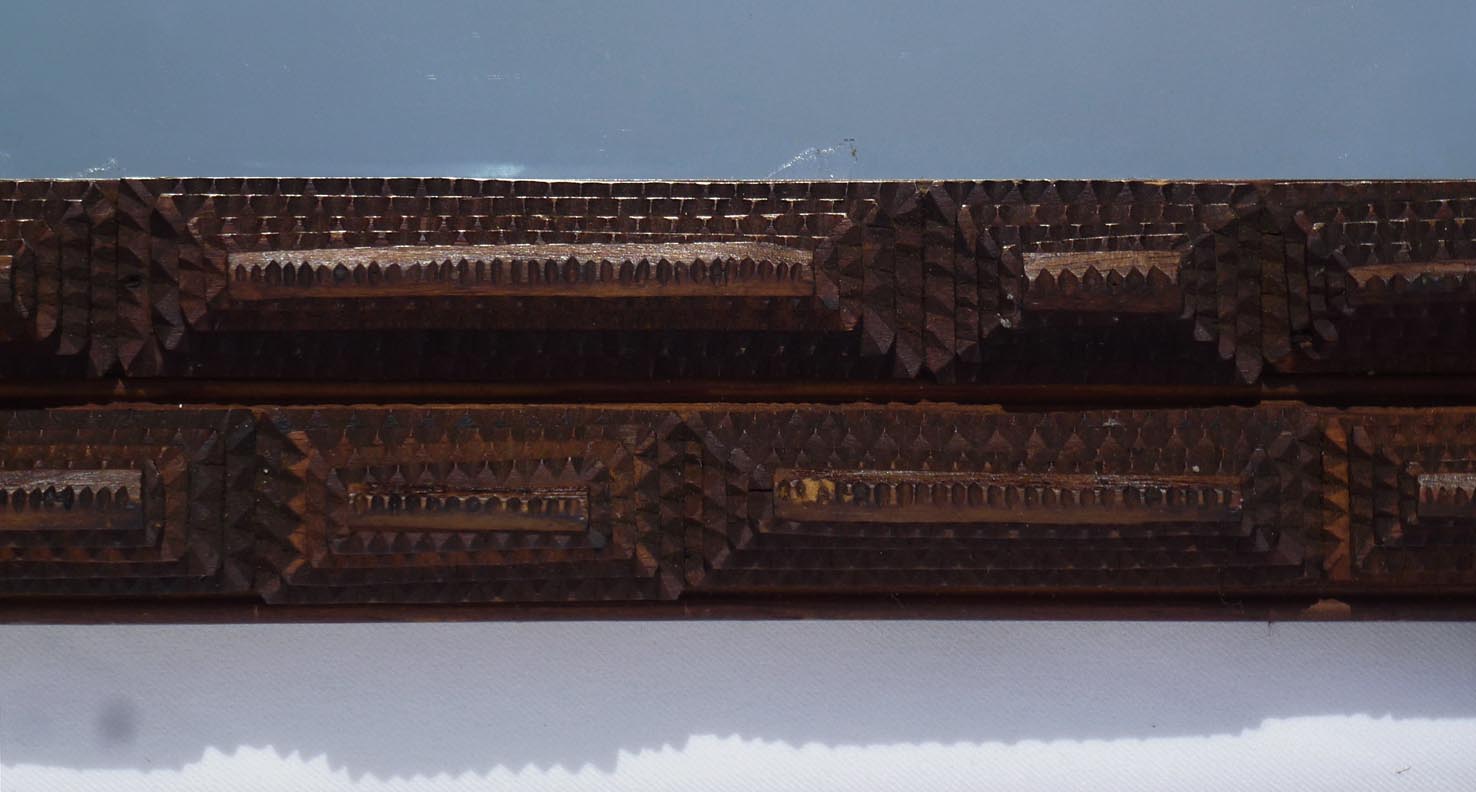 Tramp art frame