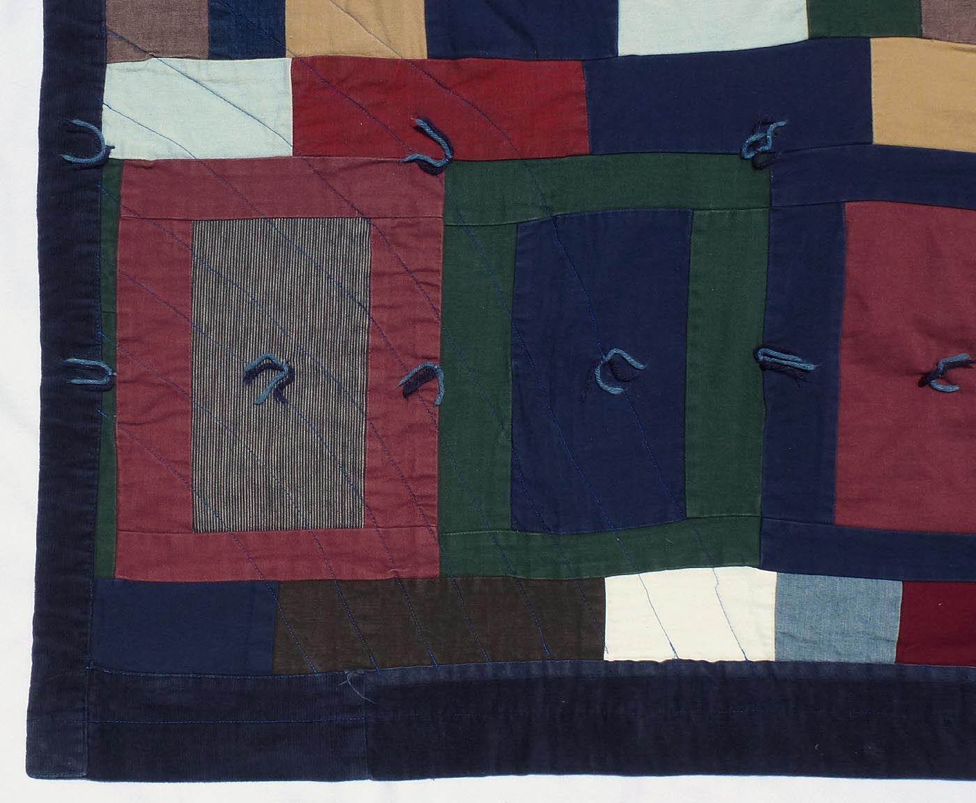 Folky strip quilt