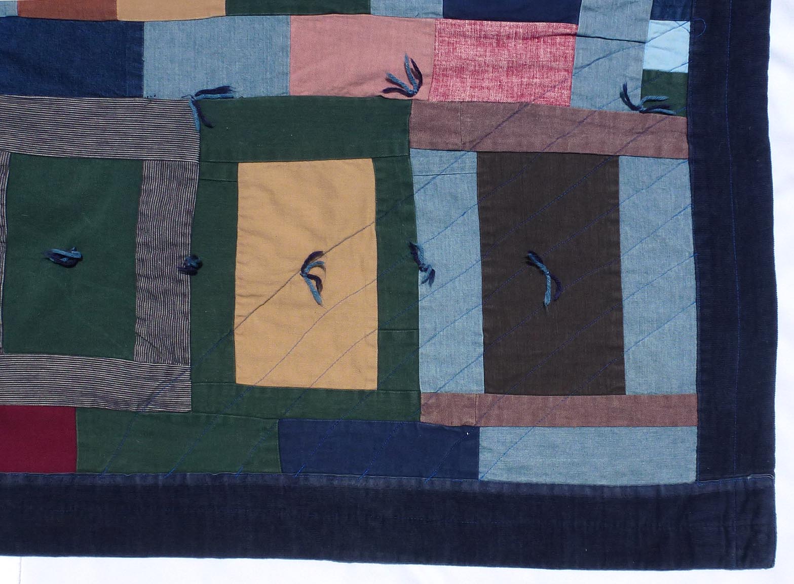 Folky strip quilt