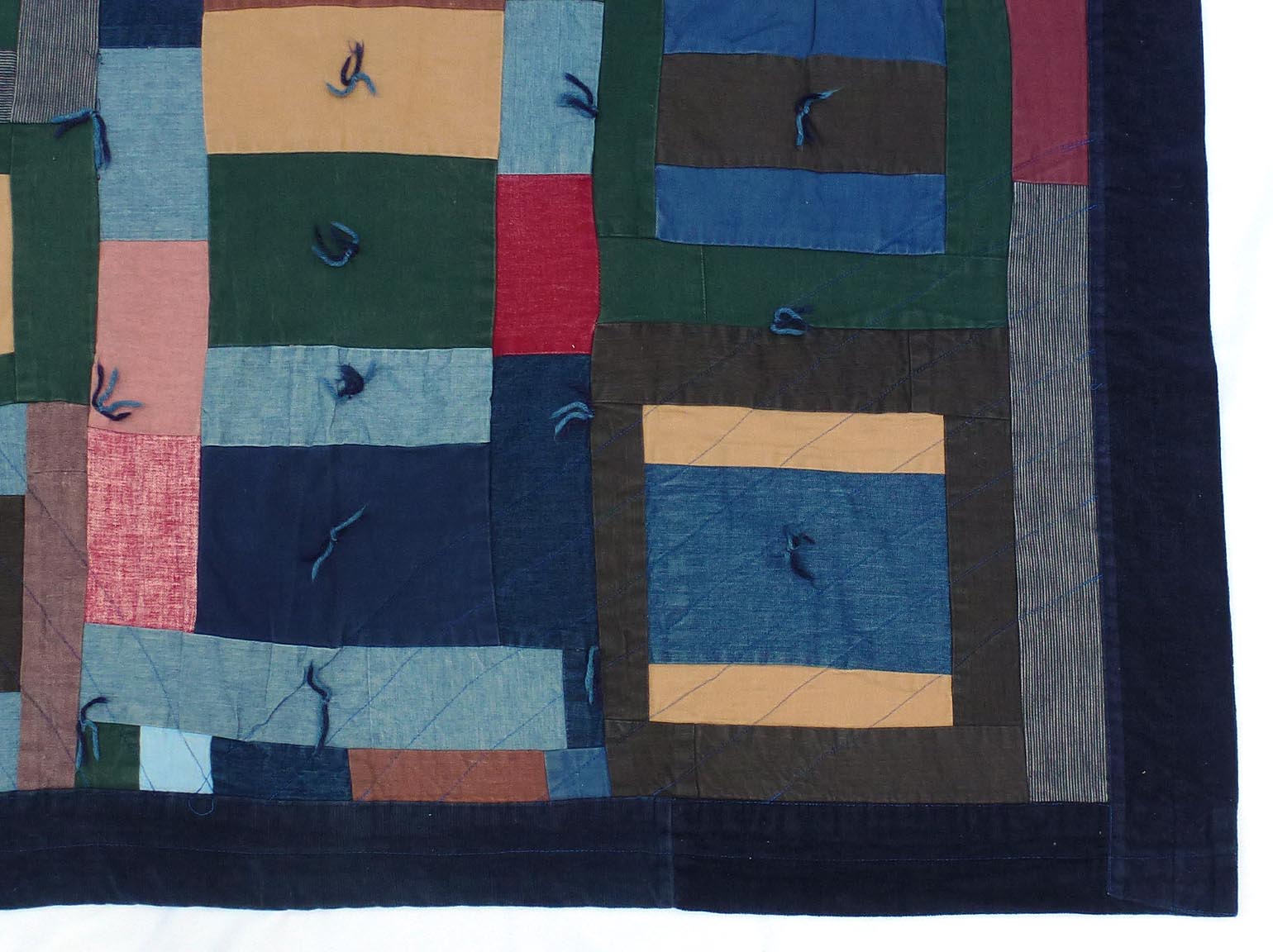 Folky strip quilt