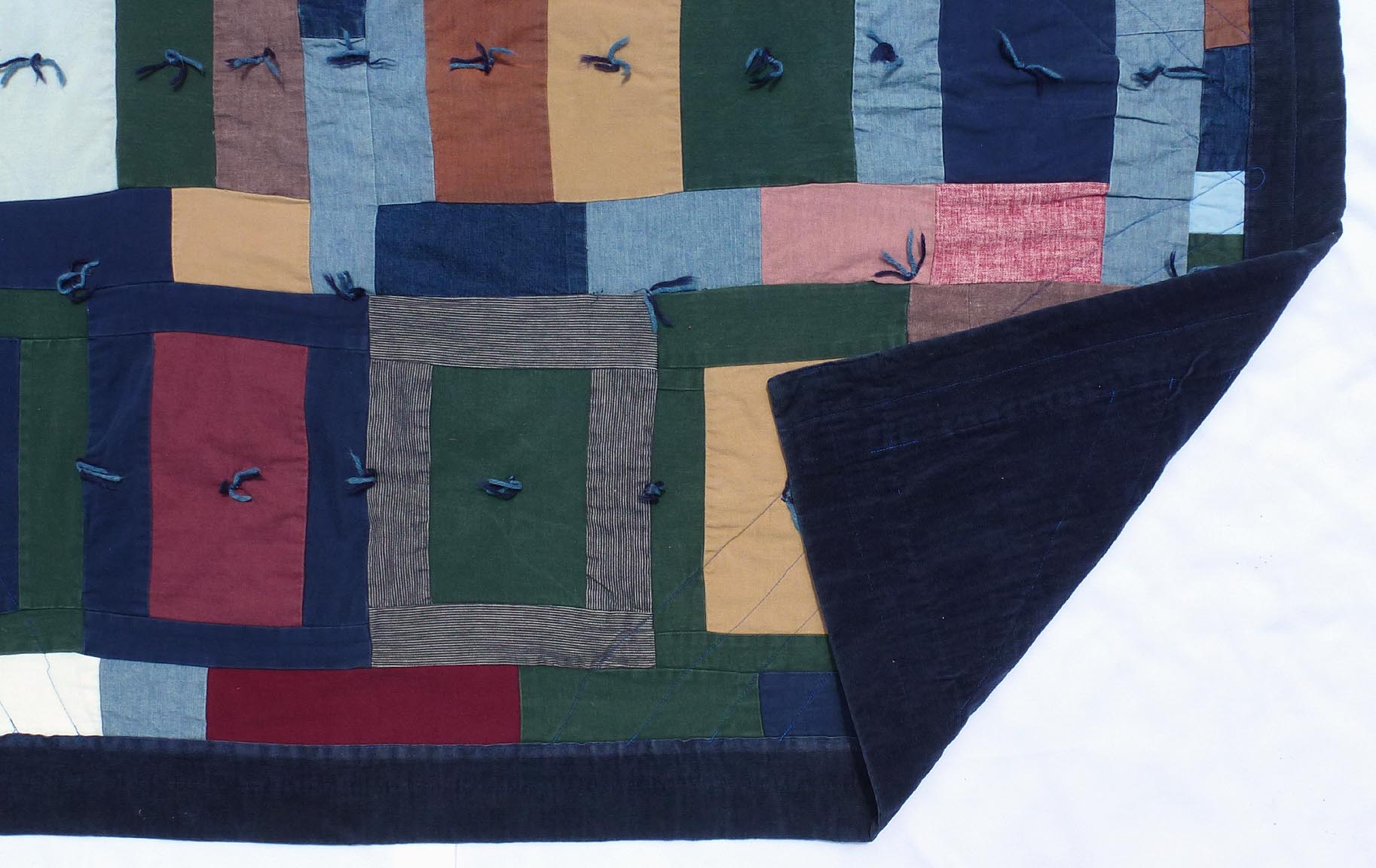 Folky strip quilt